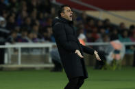 Barcelona's head coach Xavi Hernandez reacts during a Spanish La Liga soccer match between Barcelona and Valencia at the Olimpic Lluis Companys stadium in Barcelona, Spain, Monday, April 29, 2024. (AP Photo/Joan Monfort)