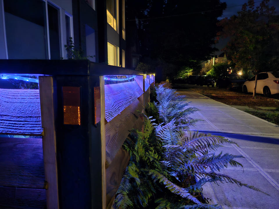 Lights on a gate at night