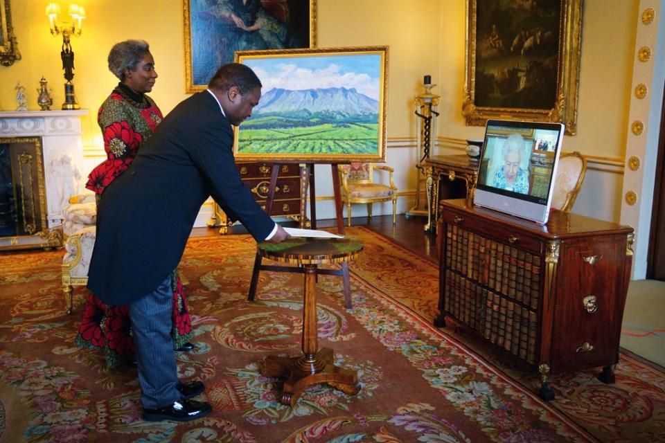 Malawi’s High Commissioner Thomas Bisika and his wife during the virtual audience with the Queen (Victoria Jones/PA) (PA Wire)