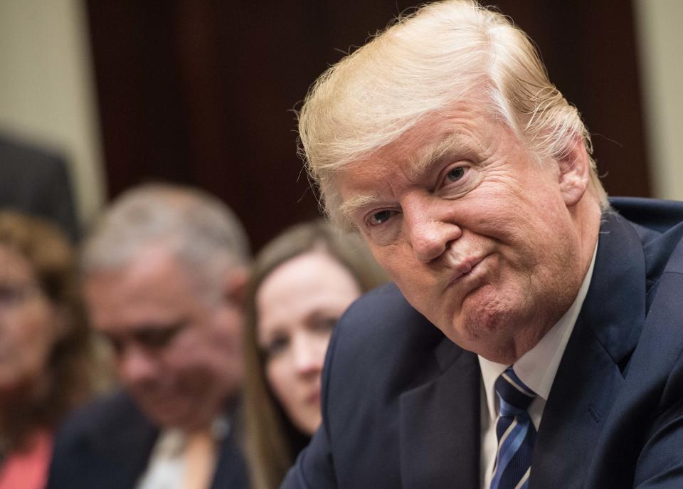 Trump attends a meeting about health care in the Roosevelt Room at the White House on March 13, 2017.