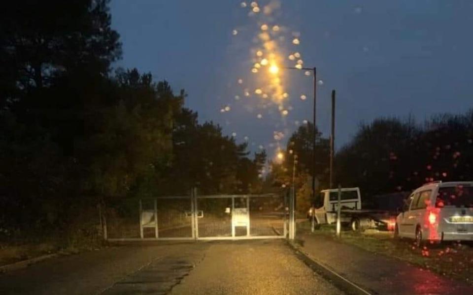 The metal barrier blocking local residents from entering and leaving their homes - SWNS