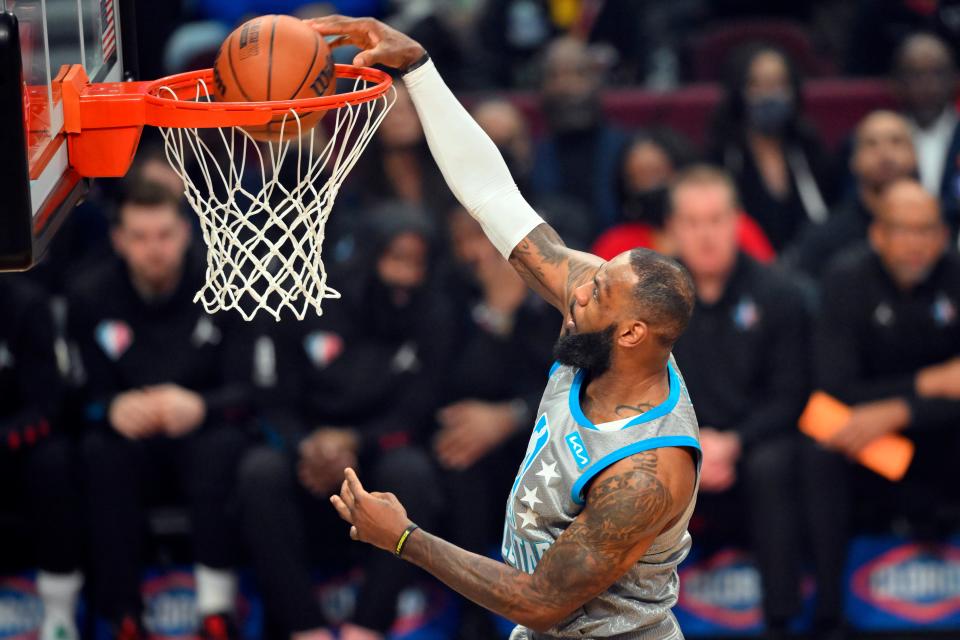 LeBron James dunks during the 2022 NBA All-Star Game, Feb. 20, 2022, in Cleveland.