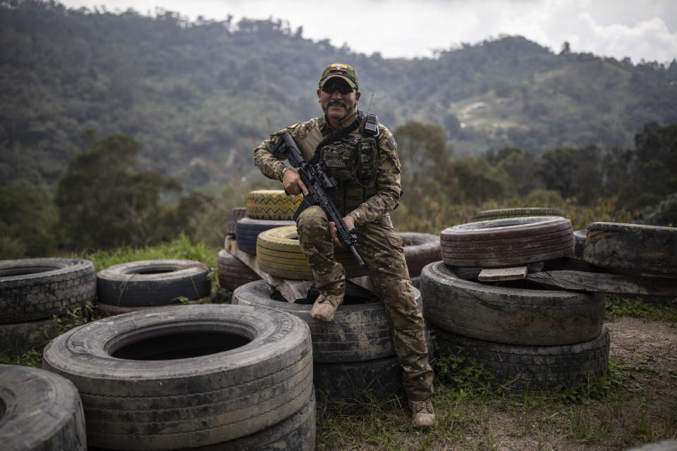 Hector Bernal, a military instructor, poses for a photo in La Mesa, Colombia, Wednesday, Jan. 10, 2024. Bernal, a retired combat medic who runs a center for tactical medicine outside Bogotá, says that in the last eight months he’s trained more than 20 Colombians who later went on to fight in Ukraine. He says that a professional soldier who has six years in the army doesn’t make more than $600 a month in Colombia but in Ukraine the soldiers are being paid $3000 to $4000 a month. (AP Photo/Ivan Valencia)