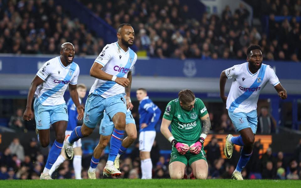 Crystal Palace's Ayew celebrates as Everton's Pickford slumps