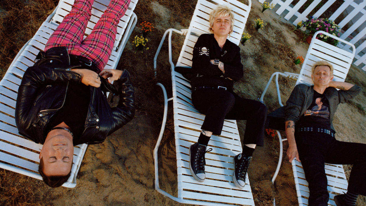  Green Day on sun loungers. 