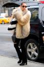 <p>In a Off-White fur coat with black flared jeans, Sol Sana heeled Chelsea boots and Adam Selman x Le Specs sunglasses while out in New York City. </p>