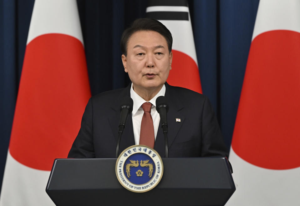 South Korean President Yoon Suk Yeol speaks during a joint press conference with Japanese Prime Minister Fumio Kishida after their meeting at the presidential office in Seoul Sunday, May 7, 2023. The leaders of South Korea and Japan met Sunday for their second summit in less than two months, as they push to mend long-running historical grievances and boost ties in the face of North Korea’s nuclear program and other regional challenges. (Jung Yeon-je/Pool Photo via AP)