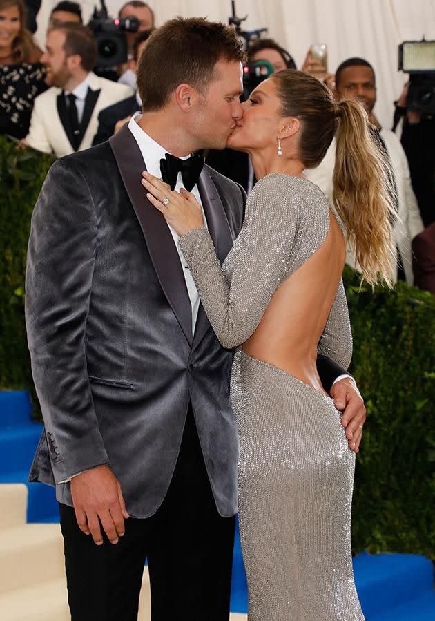 Gisele and husband Tom Brady couldn't keep their hands off each other on the Met Gala red carpet. Photo: Getty