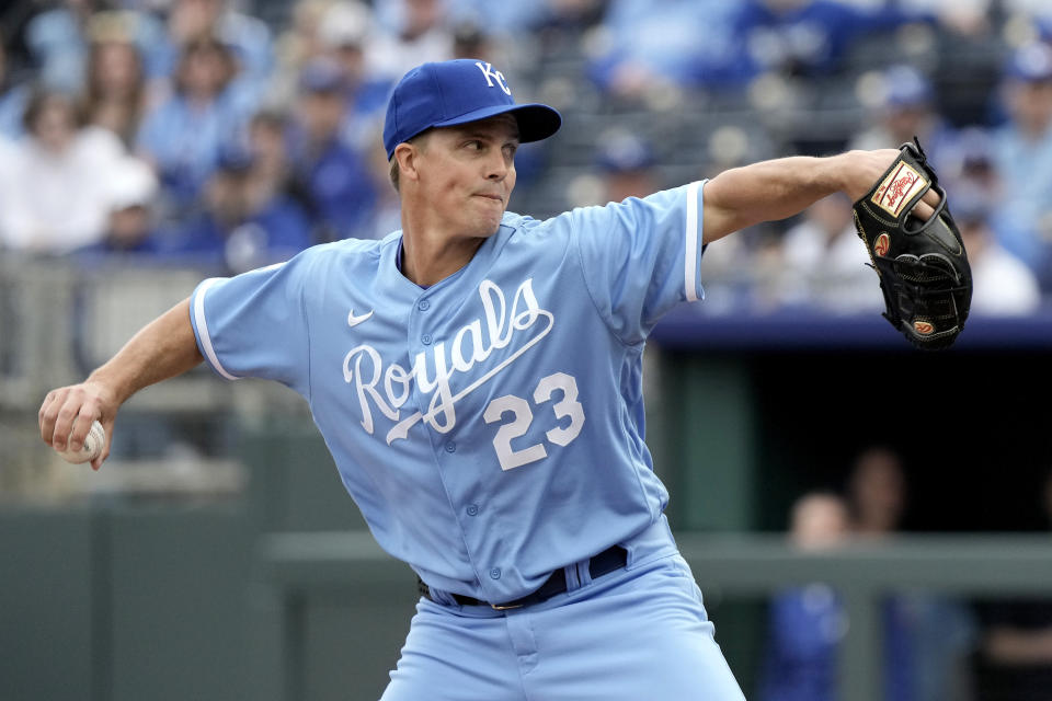 Kansas City Royals starting pitcher Zack Greinke throws during the first inning of an opening day baseball game against the Minnesota Twins in Kansas City, Mo., Thursday, March 30, 2023. (AP Photo/Charlie Riedel)