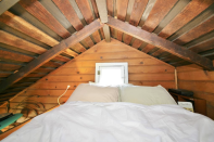 <p>The bedroom is tucked away in a second-storey loft. (Airbnb) </p>