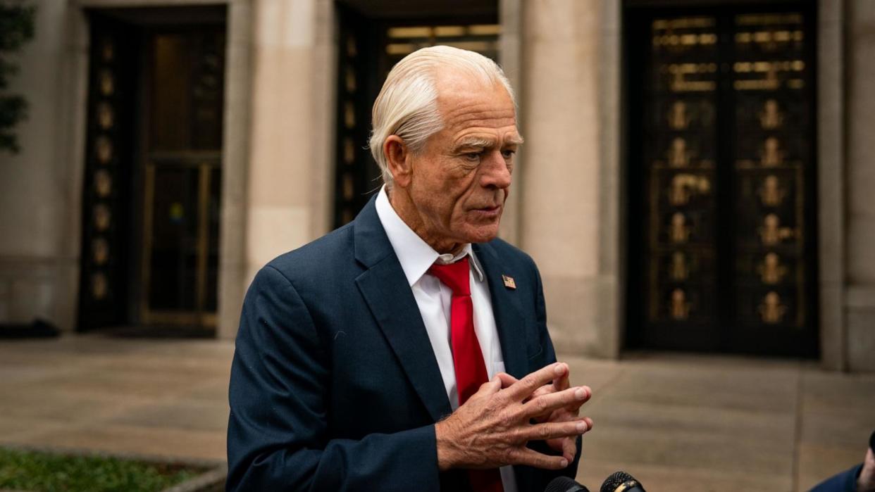 PHOTO: Peter Navarro, former White House trade adviser, speaks to members of the media while arriving for his sentencing at federal court in Washington, DC on Jan. 25, 2024. (Kent Nishimura/Bloomberg via Getty Images, FILE)