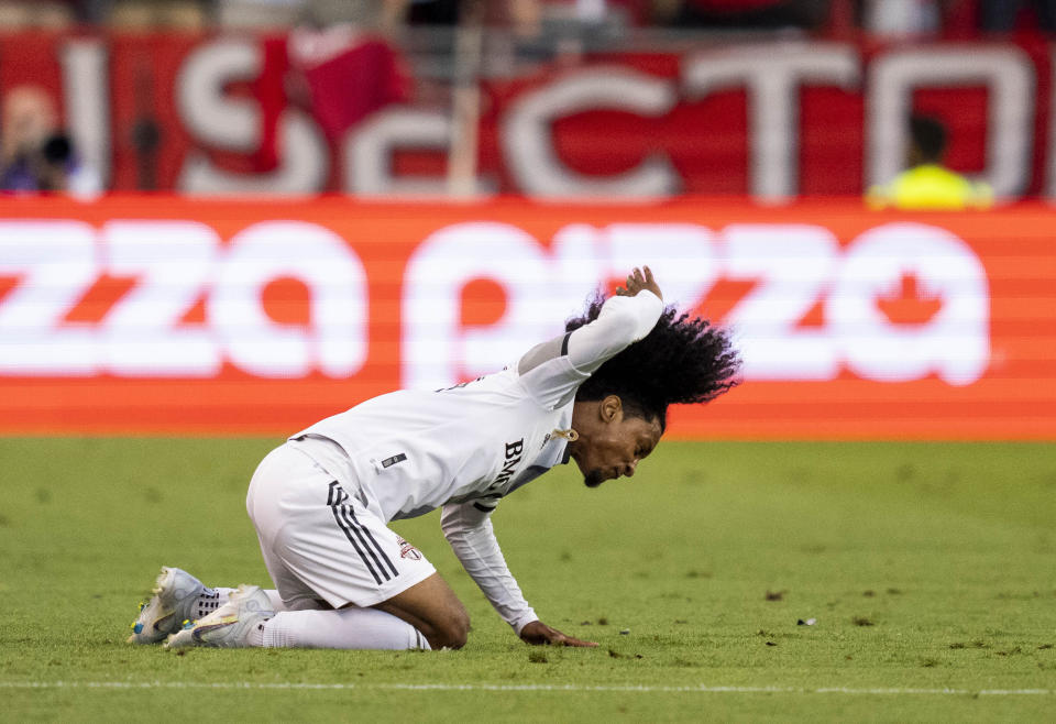 Toronto FC forward Jayden Nelson (11) reacts during the first half of the team's MLS soccer match against the Portland Timbers in Toronto on Saturday, Aug. 13, 2022. (Andrew Lahodynskyj/The Canadian Press via AP)