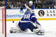 St. Louis Blues left wing Pavel Buchnevich (89) scores past Tampa Bay Lightning goaltender Andrei Vasilevskiy (88) during the first period of an NHL hockey game Friday, Nov. 25, 2022, in Tampa, Fla. (AP Photo/Chris O'Meara)