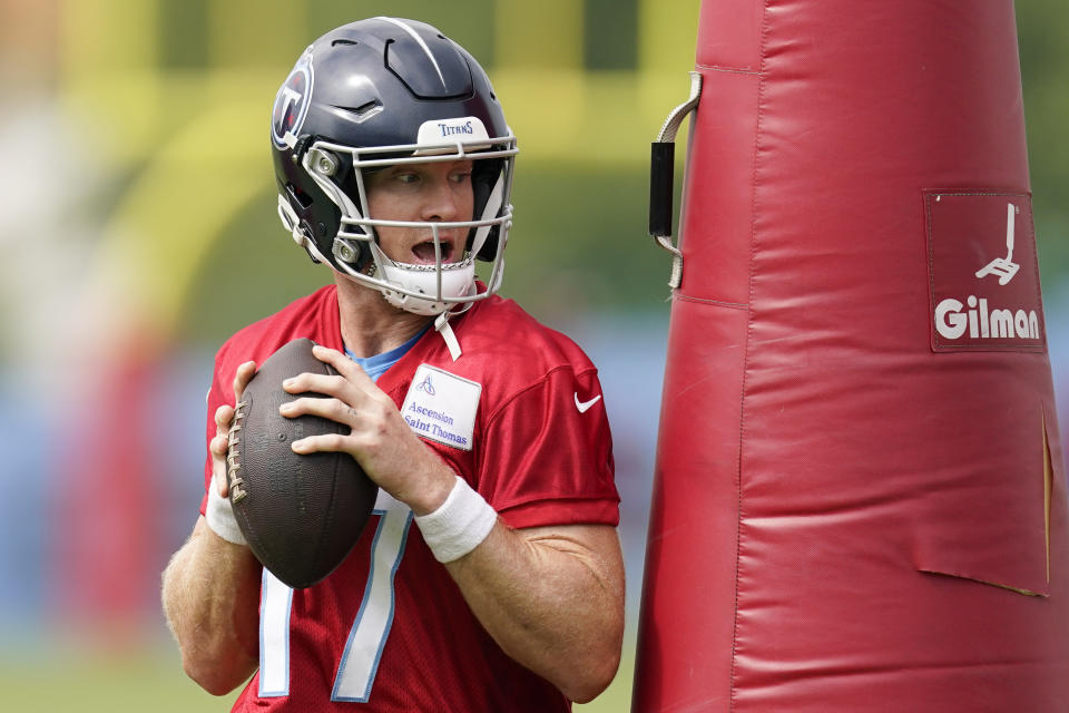 Tennessee Titans quarterback Ryan Tannehill runs through drills during an NFL football training camp practice Wednesday, July 26, 2023, in Nashville, Tenn. (AP Photo/George Walker IV)