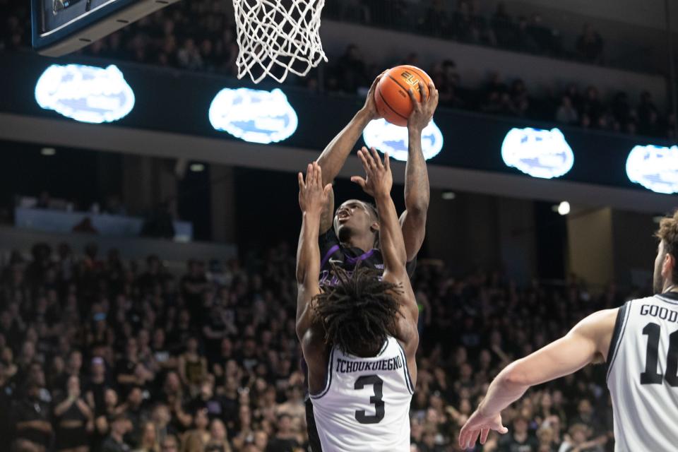 GCU guard Tyon Grant-Foster (7) goes up for the shot at Grand Canyon University Arena in Phoenix on Feb. 17, 2024.