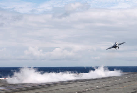 U.S. Navy aircraft carrier USS Ronald Reagan conducts joint drills with the South Korean navy at sea October 19, 2017. Picture taken on October 19, 2017. REUTERS/Tim Kelly