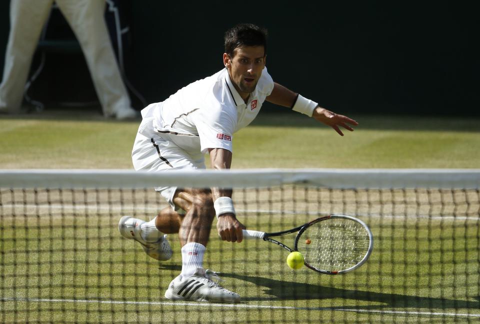 Serbia's Novak Djokovi in the Men's Final against Great Britain's Andy Murray during day thirteen of the Wimbledon Championships at The All England Lawn Tennis and Croquet Club, Wimbledon.