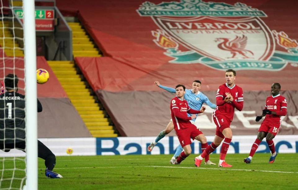 Phil Foden scored the last time Man City beat Liverpool at Anfield - but it was behind closed doors (Getty Images)