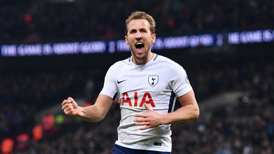 Harry Kane scored his 100th Premier League goal in stoppage time to secure Tottenham a 2-2 draw against Liverpool.