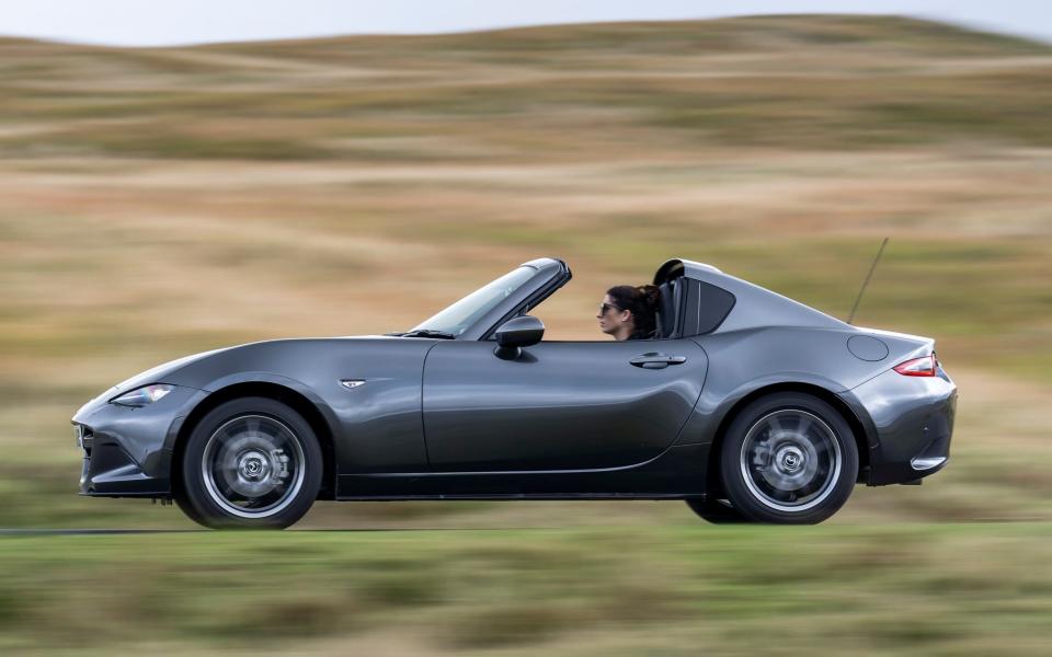 Mazda's MX-5 offers both less grunt and less warranty