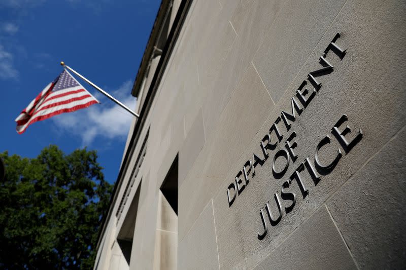 FILE PHOTO: Signage is seen at the United States Department of Justice headquarters in Washington, D.C.
