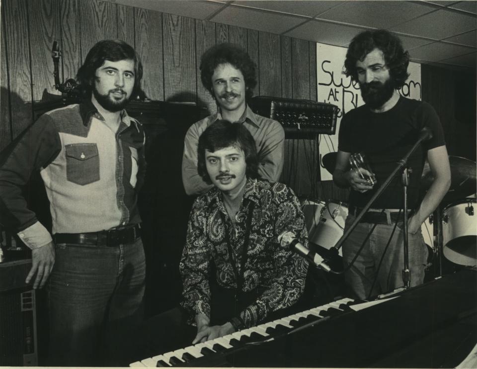 Milwaukee jazz rock band Sweetbottom, pictured here in 1975, included Warren Wiegratz (seated) and (standing from left) Mike Murphy, Daryl Stuermer and Duane Stuermer. Guitarist Daryl Stuermer began playing with Jean-Luc Ponty that year, and started touring with Genesis in 1978.