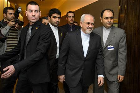 Iranian Foreign Minister Mohammad Javad Zarif (2nd R) arrives for talks over Iran's nuclear programme in Geneva November 22, 2013. REUTERS/Fabrice Coffrini/Pool