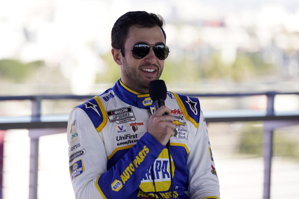 Chase Elliott answers questions after a practice session at the Los Angeles Memorial Coliseum, Saturday, Feb. 5, 2022, in Los Angeles, ahead of a NASCAR exhibition auto race. (AP Photo/Marcio Jose Sanchez)