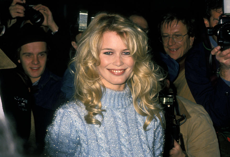 <p>Claudia Schiffer attends the party for the New Fashion Cafe wearing a turtle-neck knitted jumper,1994</p>