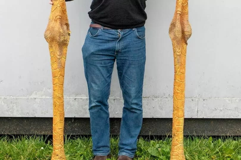 Charles Hanson with chicken leg stilts used in Star Wars.