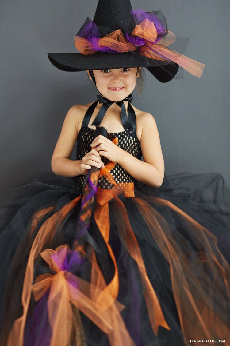 <p>Another purple, orange, and black option, this DIY is gorgeously spooky (and a great dress f0r twirling too).</p><p><strong>Get the tutorial at <a href="https://liagriffith.com/kids-diy-witch-costume/" rel="nofollow noopener" target="_blank" data-ylk="slk:Lia Griffith;elm:context_link;itc:0;sec:content-canvas" class="link ">Lia Griffith</a>. </strong> </p><p><a class="link " href="https://www.amazon.com/Expo-Classic-Tulle-25-Yard-Orange/dp/B007Q2JIMG/ref=sr_1_3?tag=syn-yahoo-20&ascsubtag=%5Bartid%7C10050.g.28304812%5Bsrc%7Cyahoo-us" rel="nofollow noopener" target="_blank" data-ylk="slk:SHOP ORANGE TULLE;elm:context_link;itc:0;sec:content-canvas">SHOP ORANGE TULLE</a> </p>