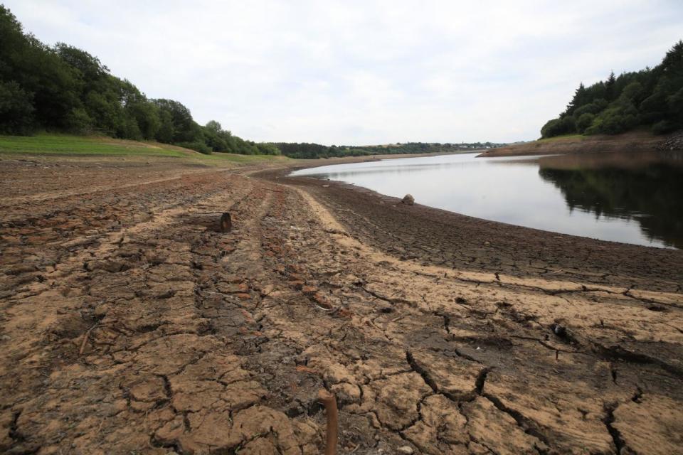 Low water levels in Wayoh Reservoir at Edgworth near Bolton as millions of people are facing a hosepipe ban (PA)