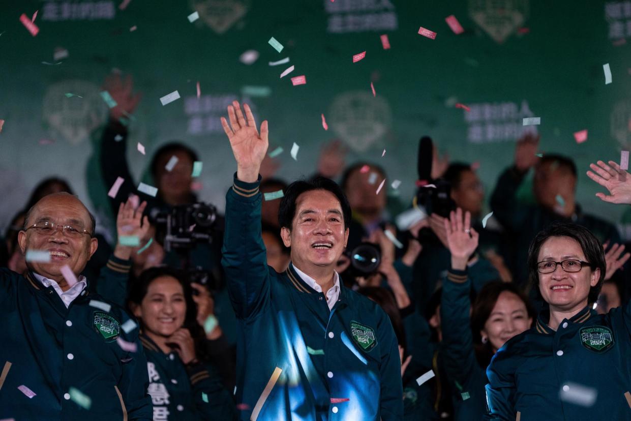<span>William Lai, center, prevailed in Taiwan’s presidential election in January, despite AI efforts by China to sink his candidacy.</span><span>Photograph: Louise Delmotte/AP</span>