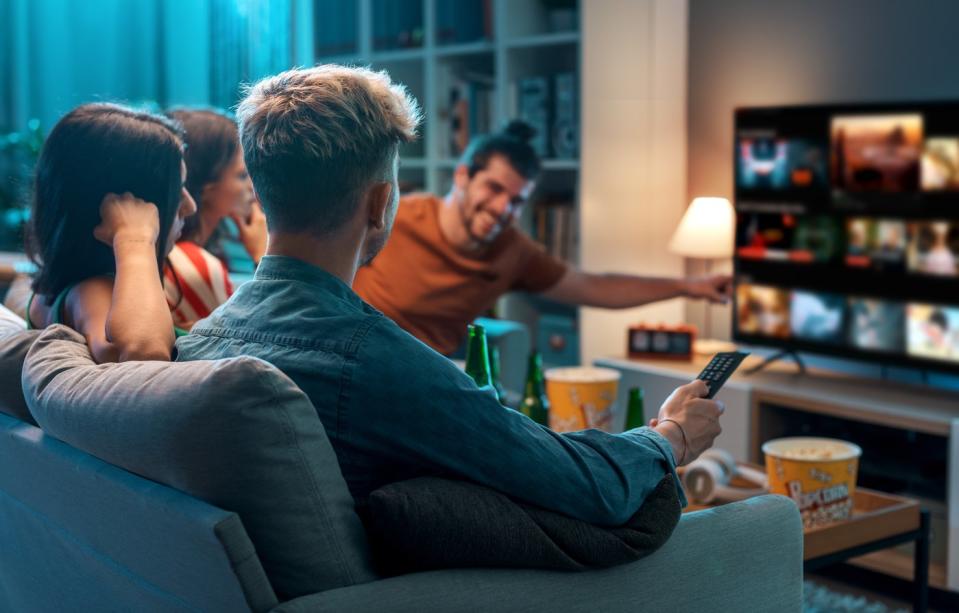 Group of people watching TV streaming service.