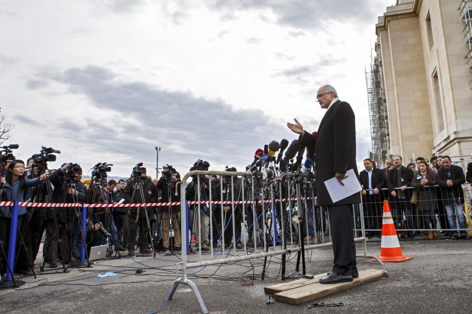 Syrian chief negotiator Bashar Jaafari, Ambassador of the Permanent Representative Mission of Syria to the UN in New York, speaks to the media during a ns conference after the second round of negotiations between the Syrian government and the opposition at the European headquarters of the United Nations, in Geneva, Switzerland, Saturday , Feb. 15, 2014. U.N.-Arab League mediator Lakhdar Brahimi ended direct talks between the Syrian government and opposition Saturday without finding a way of breaking the impasse in peace talks. Saturday's talks, which lasted less than half an hour, left the future of the negotiating process in doubt. (AP Photo/Keystone, Salvatore Di Nolfi)