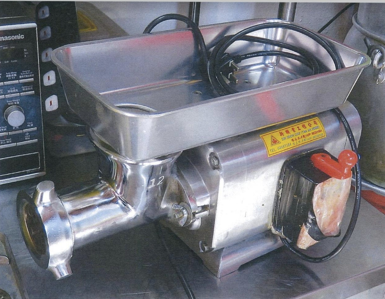 Photo of the electric meat grinder which was used. (PHOTO: Ministry of Manpower)