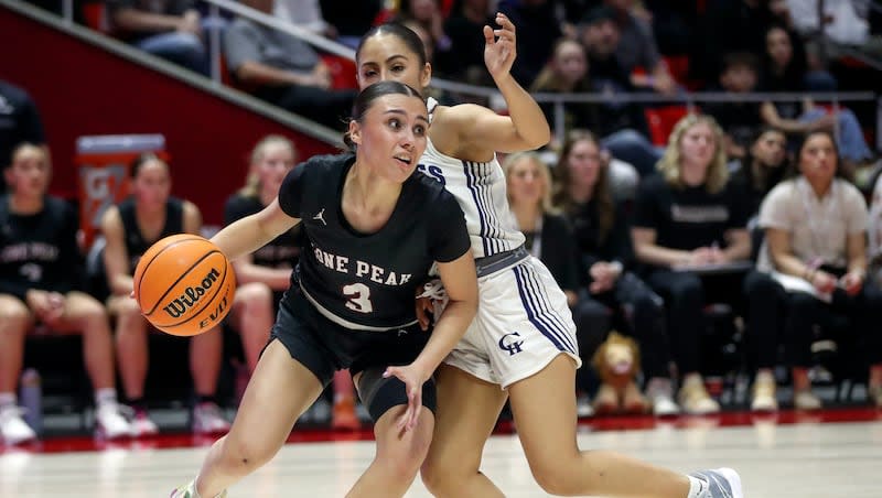 Lone Peak’s Shawnee Nordstrom moves around Copper Hills’ Alyssa Loza during the 6A girls basketball state championship game at the Huntsman Center in Salt Lake City on Friday, March 1, 2024. Lone Peak won 65-47.