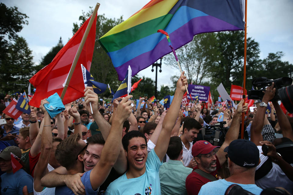 Same-sex marriage supporters rejoice after the U.S Supreme Court hands down a ruling regarding same-sex marriage June 26, 2015 outside the Supreme Court in Washington, DC. The high court ruled that same-sex couples have the right to marry in all 50 states. (Photo by Alex Wong/Getty Images)