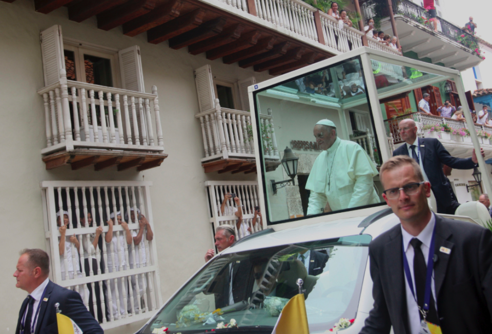 <em>The Pope is protected from danger inside his vehicle – except when he bumps his head (PA)</em>