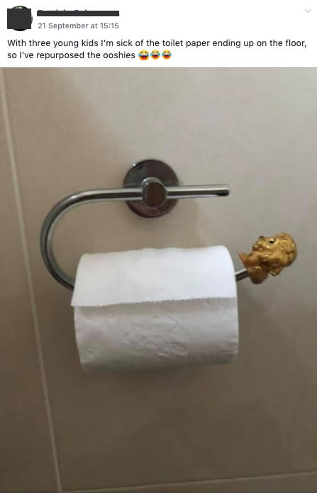 A photo of a roll of toilet paper with a Woolworths Lion King Ooshie stuck on the end as a makeshift guard.