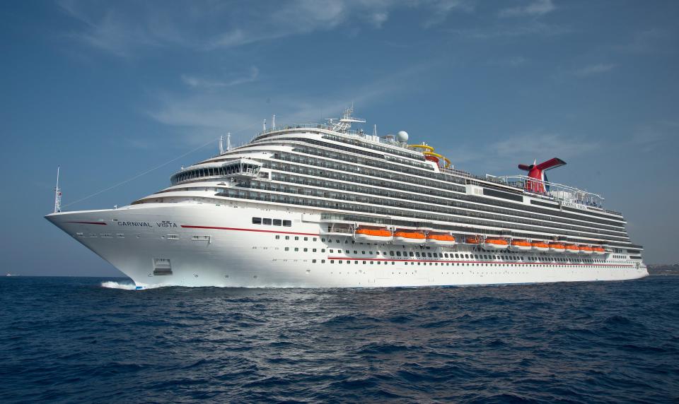 The Carnival Vista cruises at sea. Carnival Vista measures 133,500 tons, 1,055 feet long and has a guest capacity of almost 4,000 passengers.