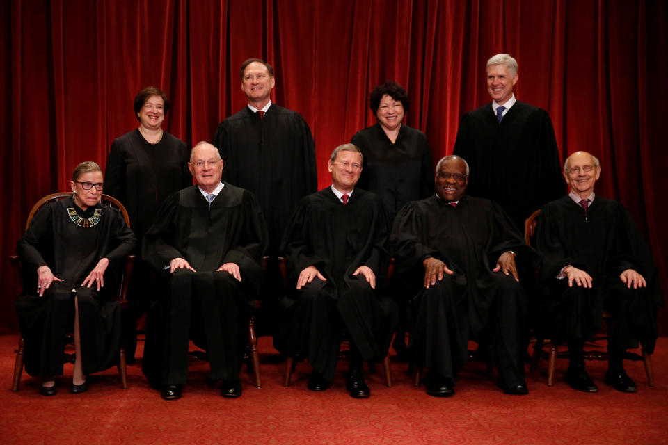 Members of the Supreme Court take a new "family" photo on June 1, 2017. Front row, from left: Justice Ruth Bader Ginsburg, Justice Anthony Kennedy, Chief Justice John Roberts, Justice Clarence Thomas and Justice Stephen Breyer. Back row, from left: Justice Elena Kagan, Justice Samuel Alito, Justice Sonia Sotomayor, and Justice Neil Gorsuch.&nbsp; (Photo: Jonathan Ernst/Reuters)