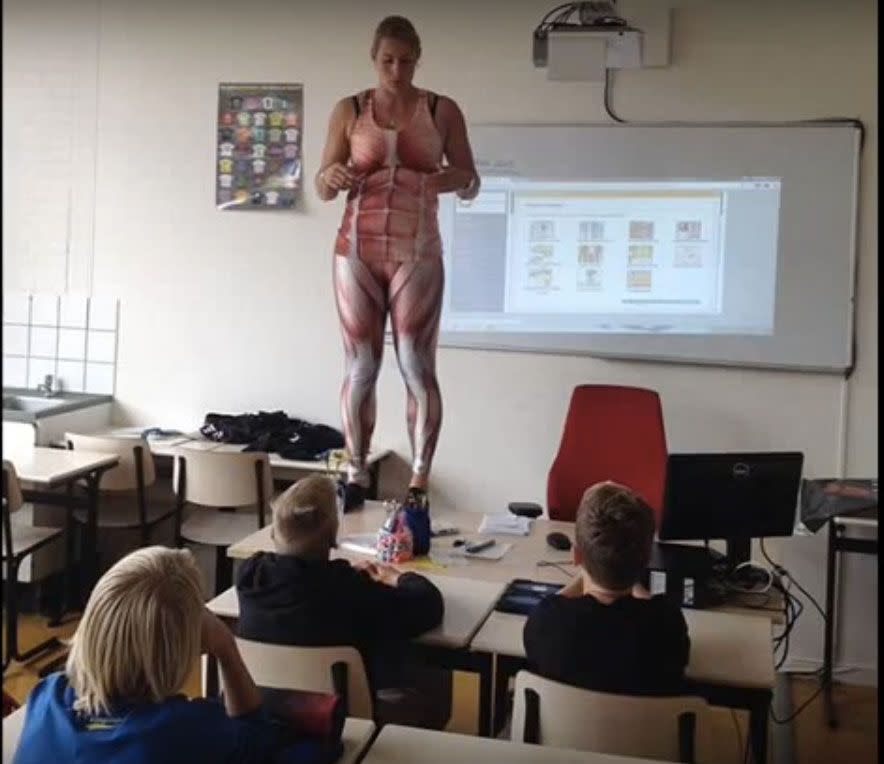 This is the moment a Dutch biology teacher revealed her anatomically-correct spandex suit in front of grade ninth students. Photo: YouTube