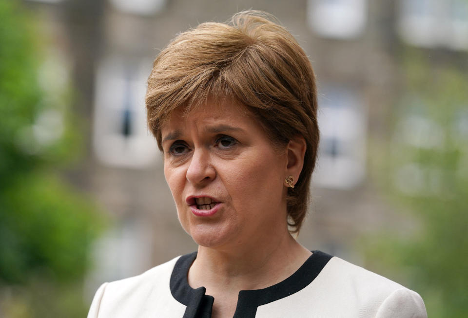 Scotland&#39;s First Minister Nicola Sturgeon speaks to the media after visiting St Margaret&#39;s House where she met EU Citizens applying for the EU Settlement Scheme on June 23, 2021 in Scotland. (Photo by Andrew Milligan / POOL / AFP) (Photo by ANDREW MILLIGAN/POOL/AFP via Getty Images)