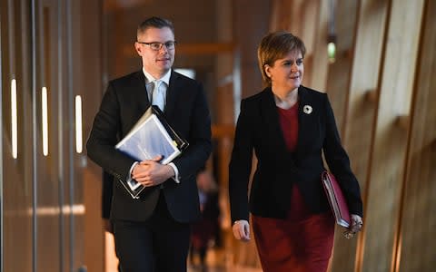 Finance Minister Derek Mackay with Nicola Sturgeon - Credit: Getty Images