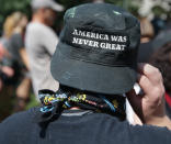 <p>A protester stands during the “Boston Free Speech” rally and counterprotest on the Boston Common in Boston, Aug. 19, 2017. (Photo: Jonathan Wiggs/The Boston Globe via Getty Images) </p>