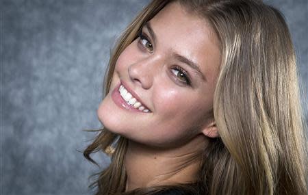 2014 Sports Illustrated cover model Nina Agdal poses for a portrait in New York February 18, 2014. REUTERS/Carlo Allegri