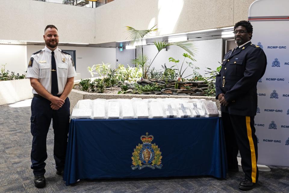 Rossel Lapointe of the Canada Border Services Agency and Joe Telus, division intelligence officer with RCMP federal policing, provided details on Thursday about a recent suspected cocaine bust at the Manitoba border. (Prabhjot Singh Lotey/CBC - image credit)