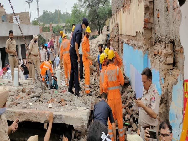 The roof of the building that was under construction suddenly collapsed on Thursday. (Photo: ANI)