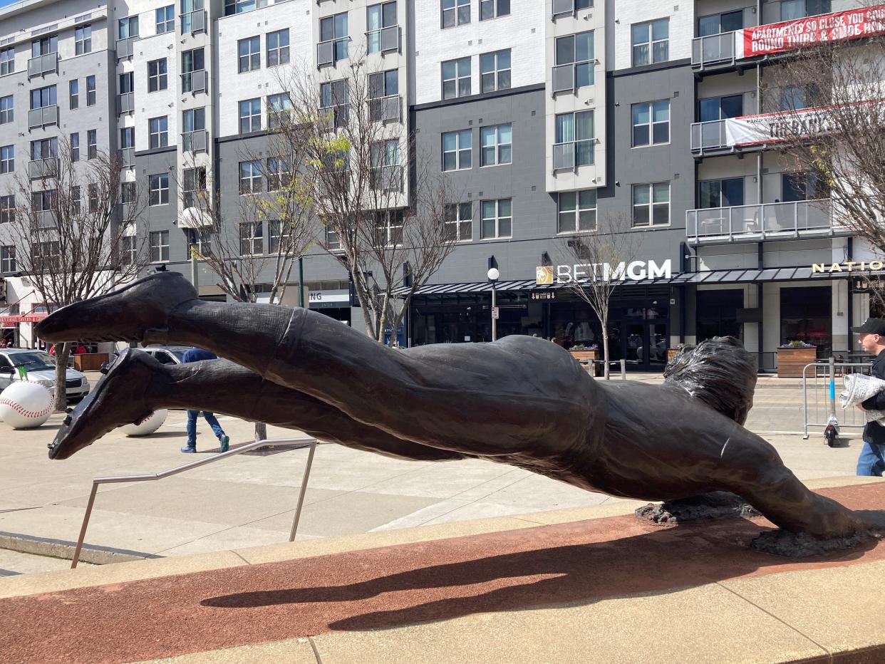 Pete Rose’s statue outside Great American Ball Park is across the street from a gambling parlor.